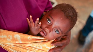 Somalia. Aqbal Mohamed Haayoow (35) and her son Cabdi (15 months) at the Jawle health center in Garowe