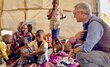 In South Sudan, WFP's Eastern Africa Regional Director talks to a displaced family from Sudan. Photo: WFP