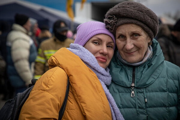 Photo: PAM/ Marco Frattini. Des réfugiés dans un centre d'accueil à Hala Kijowska, en Pologne.