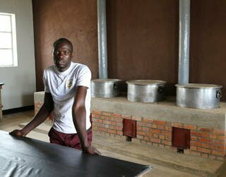 Rwanda. School cook, Felicien Rwatangaro. Photo: WFP/Daniel Kibsgaard