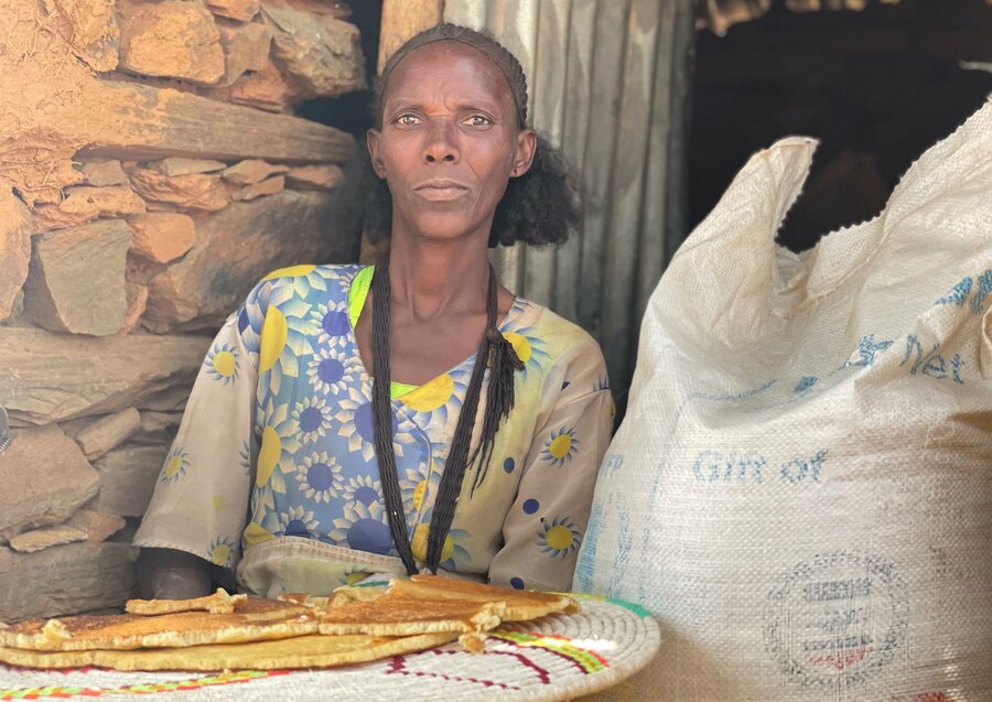Aster, who lost her home, crops and livestock in the conflict is relieved to be receiving WFP food for the first time. Photo; WFP/Claire Nevill