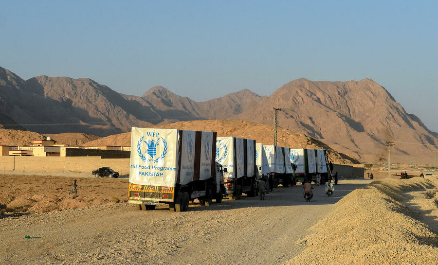 convoy of WFP trucks in arid landscape
