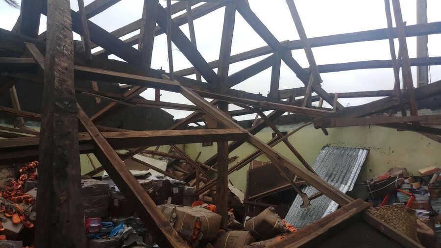 inside of a house with roof blown away by cyclone