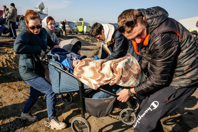 Ukrainian family at the Medyka border crossing for Poland 