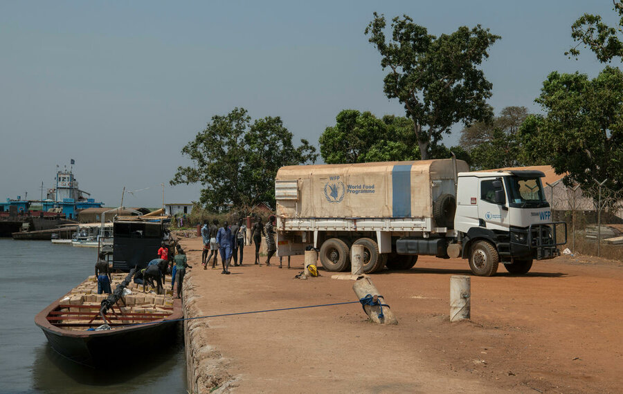 Food is received by river in Bor in the central region of South Sudan for distribution in the north of the country in March