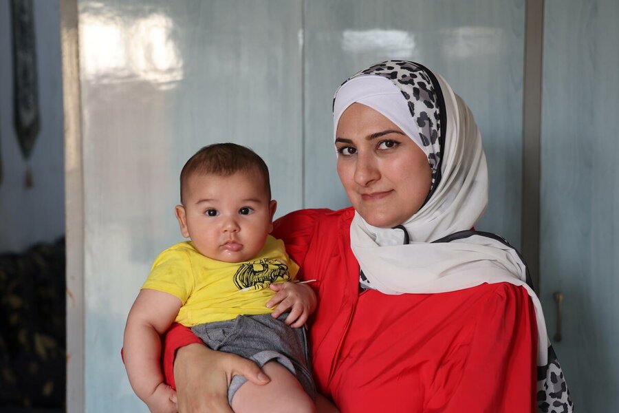 Cash assistance allows Salwa to buy the foods she most needs for her children
