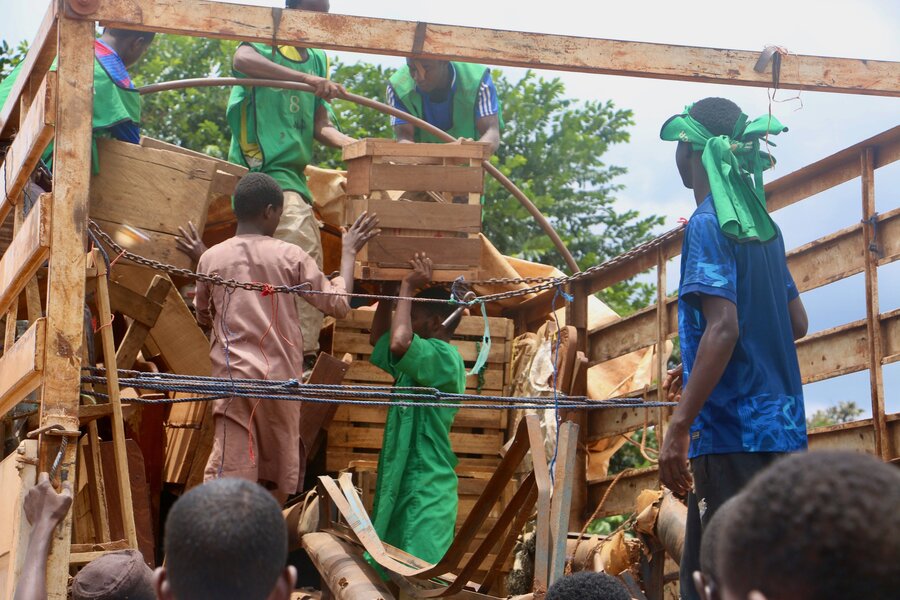 Men pack up a truck with belongings at Gado-Badzéré refugee camp, in eastern Cameroon. Photo: WFP/Mayramou Madaki